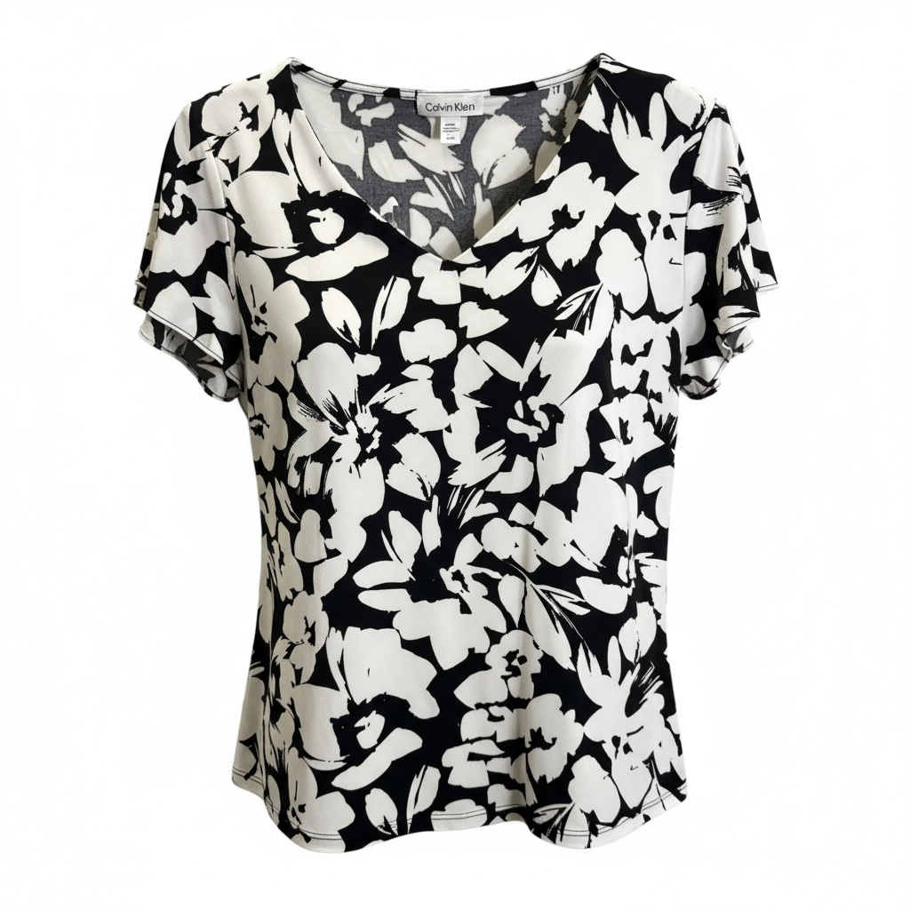 Blusa Calvin Klein Negra con Estampado Floral Blanco – Estilo Elegante Casual