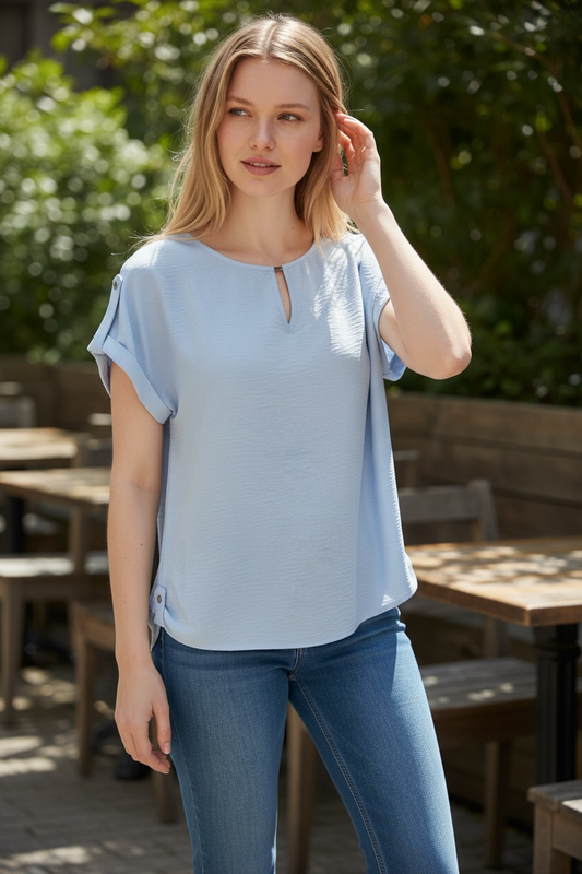 Blusa Calvin Klein azul claro de manga corta